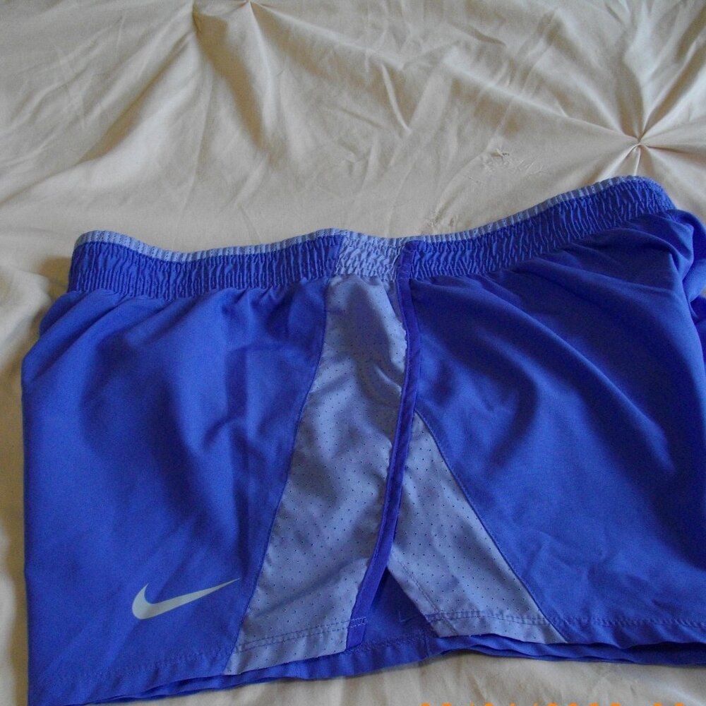 Women's Nike Dri-Fit running shorts. Medium, periwinkle blue.